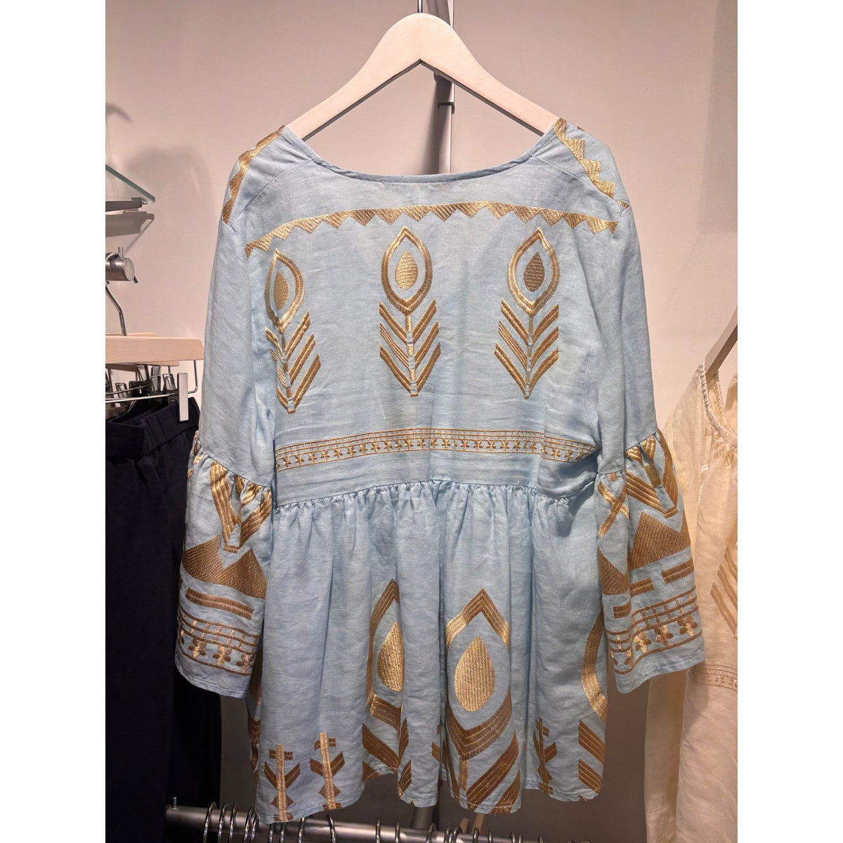 Bell Sleeve Feather Tunic